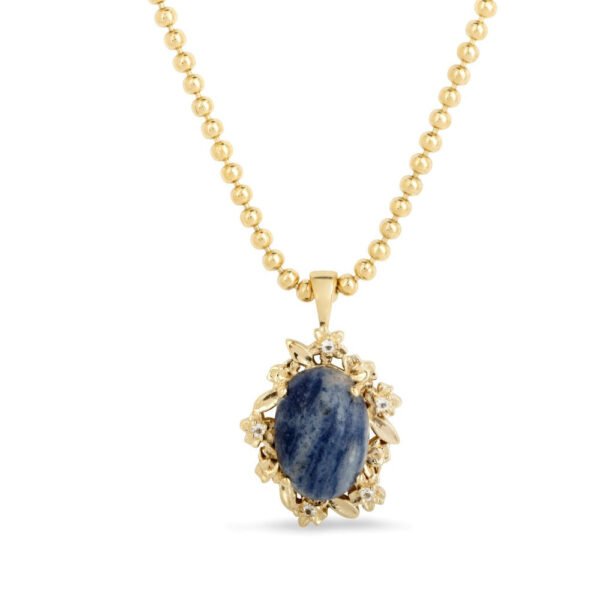 Material: 925 Sterling Silver / 14ct yellow gold plating. Finish: Highly polished metal. Gemstone: Oval cabochon sodalite (6.25ct)